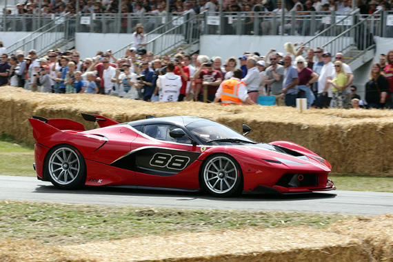 In the Supercar class, Ferrari’s latest hybrid XX program car with 1050 hp and a F1-developed Kinetic Energy Recovery System, the Ferrari FXX-K, made its debut at Goodwood.