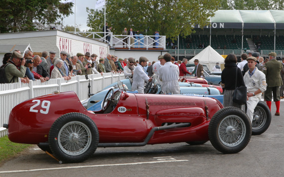 Micheal Gans Maserati V8RI awaits the arrival of the rest of the competitors for the Goodwood Trophy .